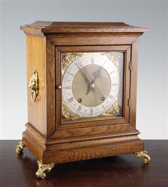 A late Victorian golden oak bracket clock, 13in.